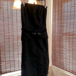 Beautiful black strapless cocktail dress. Only wore once to a Christmas party.